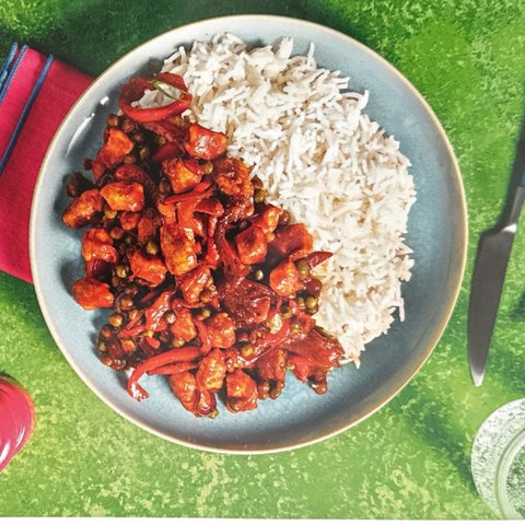 Glazed Chicken and Bell Peppers with Green Peas and Rice